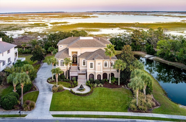 aerial view featuring a water view