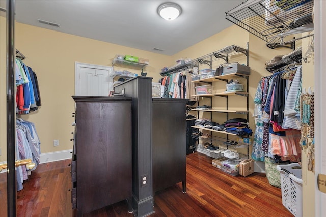 spacious closet with visible vents and wood finished floors