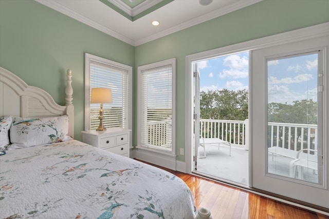 bedroom with light wood-type flooring, access to exterior, baseboards, and ornamental molding