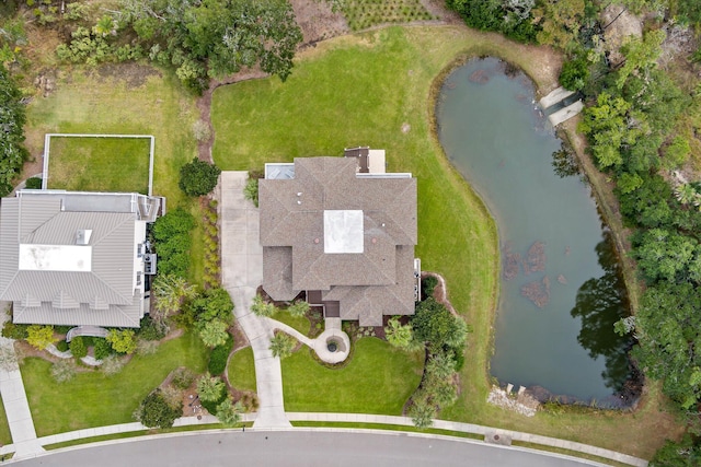 drone / aerial view with a water view