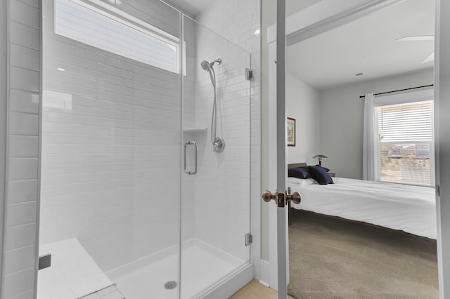 full bathroom featuring a shower stall, a healthy amount of sunlight, and connected bathroom