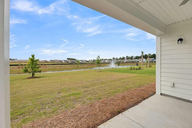 view of yard with a water view