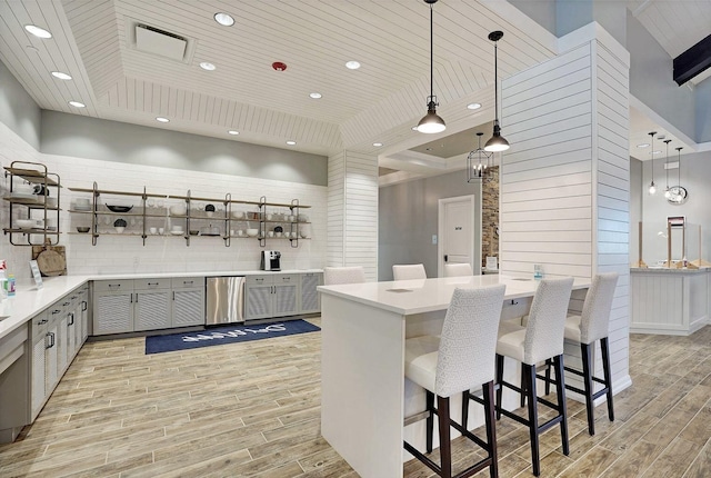 kitchen with wood ceiling, wood finish floors, and open shelves