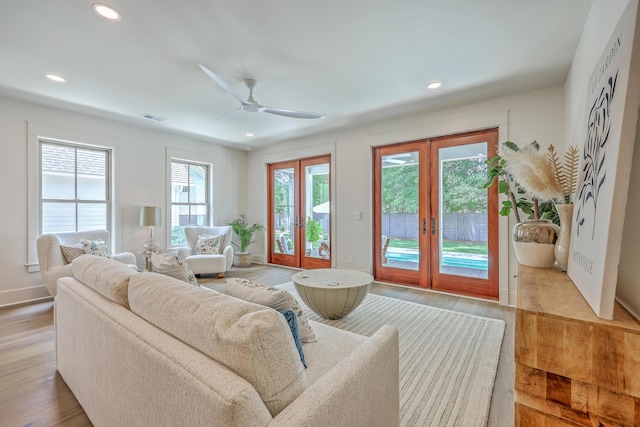 974 Cliffwood Dr, Mount Pleasant, SC 29464 - living room with french doors, healthy amount of natural light, wood finished floors, ceiling fan, and recessed lighting