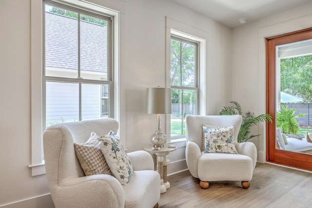 974 Cliffwood Dr, Mount Pleasant, SC 29464 - living area with healthy amount of natural light and wood finished floors