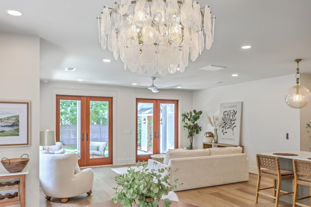 974 Cliffwood Dr, Mount Pleasant, SC 29464 - living room with french doors, light wood finished floors, and recessed lighting