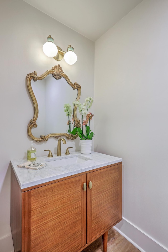 974 Cliffwood Dr, Mount Pleasant, SC 29464 - bathroom with vanity, wood finished floors, and baseboards
