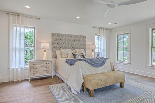 974 Cliffwood Dr, Mount Pleasant, SC 29464 - bedroom with wood finished floors, baseboards, a ceiling fan, and recessed lighting