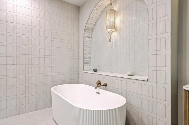 974 Cliffwood Dr, Mount Pleasant, SC 29464 - full bathroom with tile walls and a soaking tub