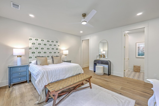 974 Cliffwood Dr, Mount Pleasant, SC 29464 - bedroom with wood finished floors, baseboards, recessed lighting, a ceiling fan, and ensuite bathroom