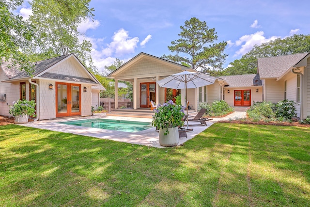 974 Cliffwood Dr, Mount Pleasant, SC 29464 - back of property featuring french doors, a patio area, a storage structure, an outdoor pool, and an outdoor structure
