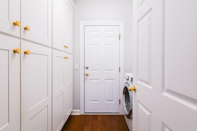 interior space with washer / clothes dryer and dark hardwood / wood-style flooring