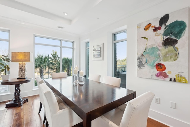 dining room featuring recessed lighting, wood finished floors, visible vents, and baseboards