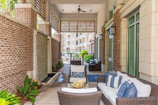 view of patio / terrace with ceiling fan and an outdoor hangout area