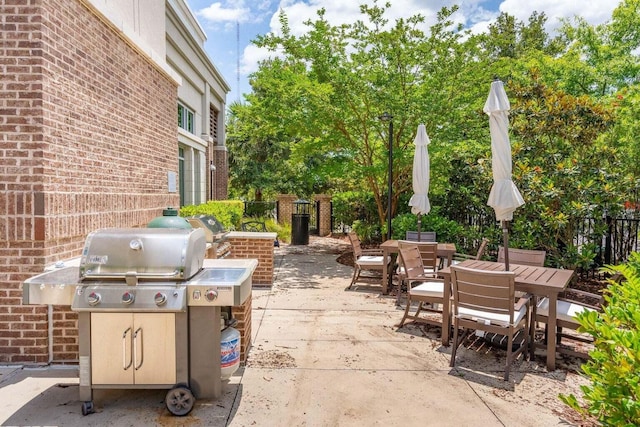 view of patio featuring outdoor dining space and area for grilling