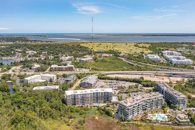 drone / aerial view featuring a water view and a city view