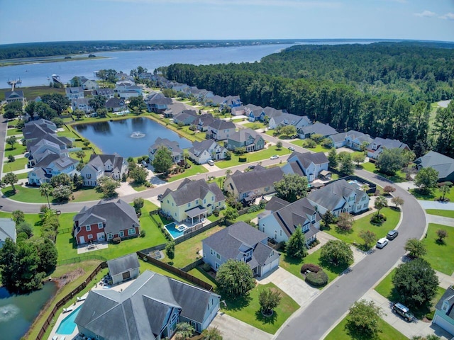 drone / aerial view with a water view