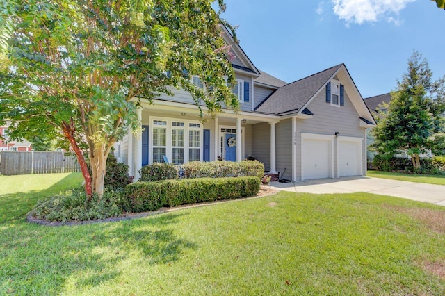 view of front facade featuring a garage and a front lawn