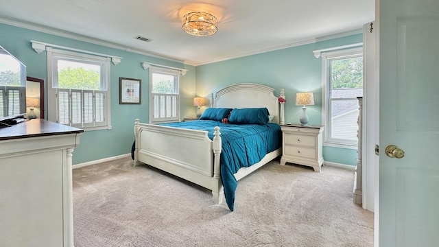 bedroom featuring crown molding, light carpet, multiple windows, and baseboards