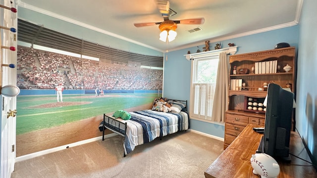 carpeted bedroom with baseboards, crown molding, and a ceiling fan