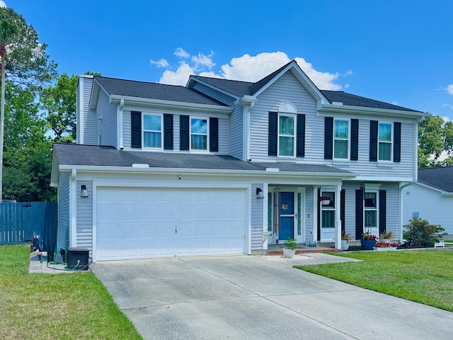 view of front of house featuring concrete driveway, a garage, and covered porch