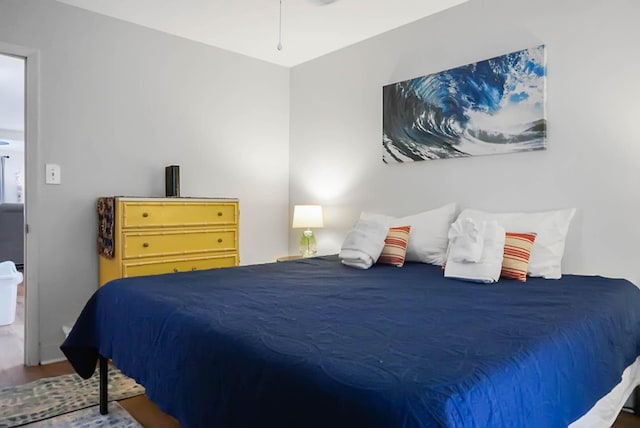 bedroom with wood finished floors