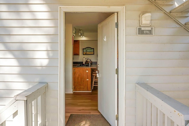 doorway to property with a sink