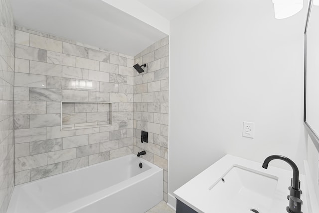 bathroom featuring vanity and bathing tub / shower combination
