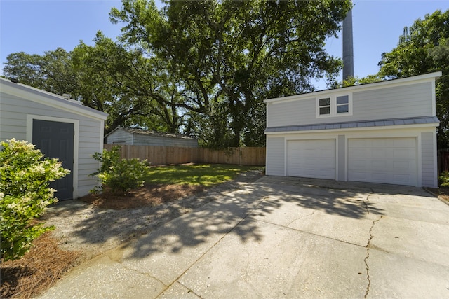 garage with fence