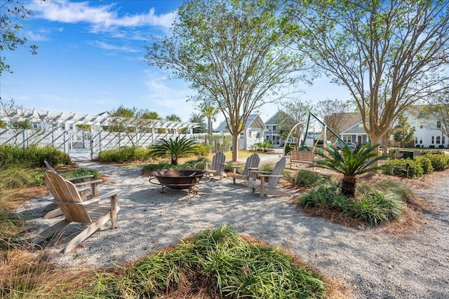 view of patio featuring an outdoor fire pit