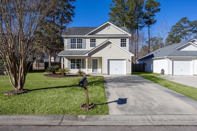 view of property featuring a garage, covered porch, and a front yard