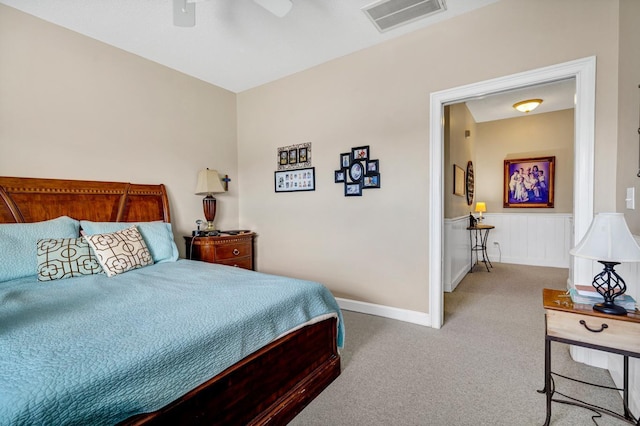 bedroom with ceiling fan and carpet floors