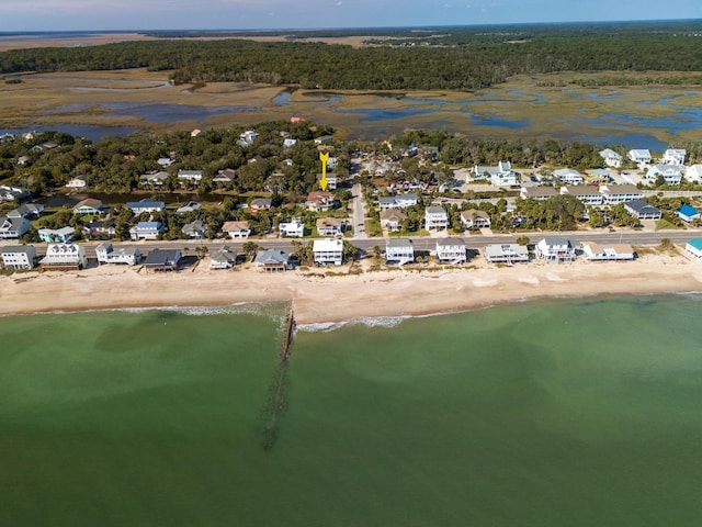 bird's eye view featuring a beach view and a water view