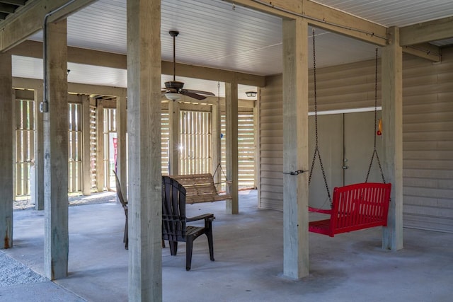 exterior space featuring concrete flooring and ceiling fan