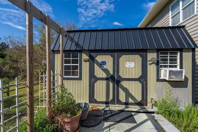 view of outdoor structure featuring cooling unit