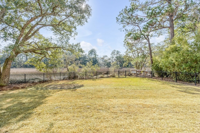 view of yard with a rural view