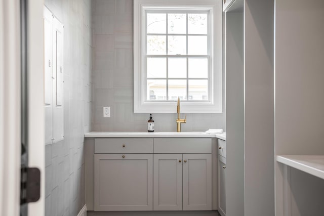 bathroom with a healthy amount of sunlight and vanity