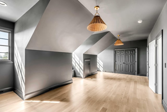 bonus room featuring light hardwood / wood-style flooring