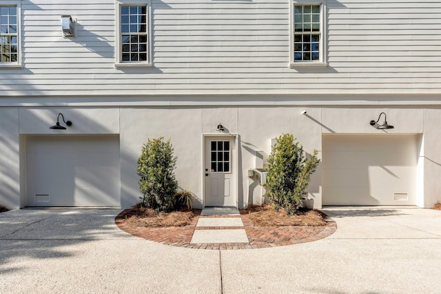 entrance to property featuring a garage