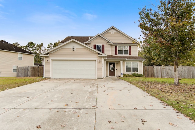 view of front of property with a garage