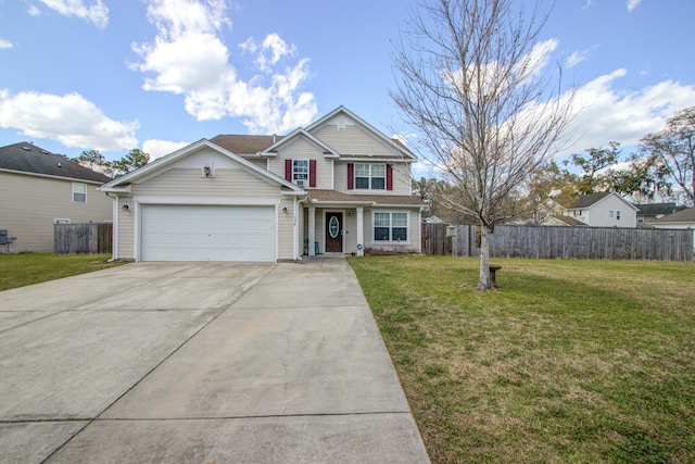 174 Education Blvd, Ladson, SC 29456 - view of front facade with concrete driveway, a garage, fence, and a front lawn