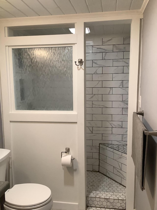 full bath with a shower stall and toilet