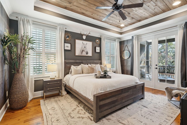 bedroom featuring french doors, access to exterior, ceiling fan, light hardwood / wood-style flooring, and wood ceiling