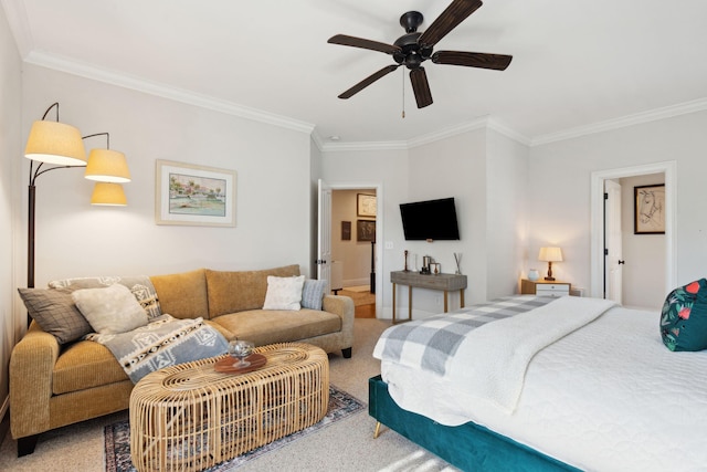 bedroom featuring ceiling fan, crown molding, and carpet