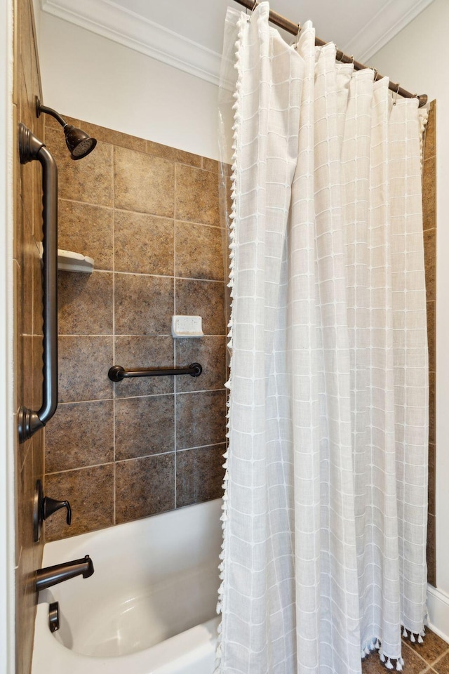 bathroom with shower / tub combo with curtain and crown molding