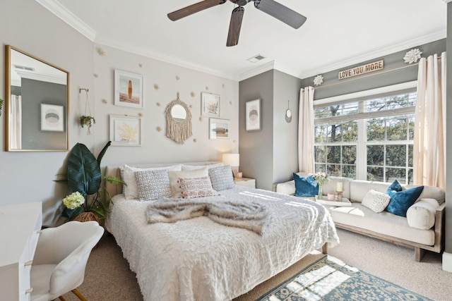 bedroom featuring ceiling fan, crown molding, and carpet floors