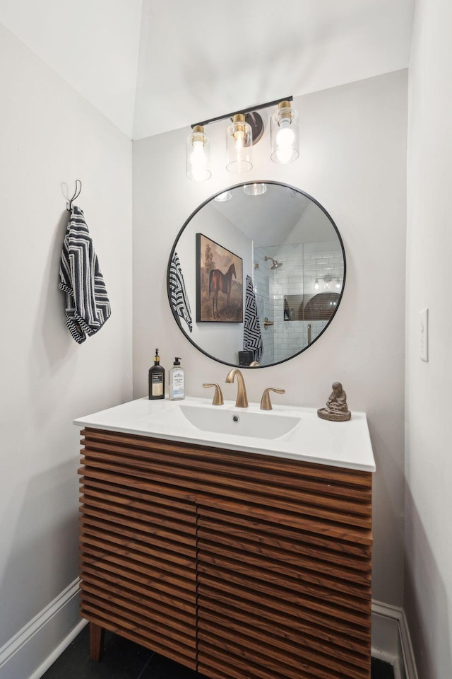 bathroom with tile patterned floors and vanity