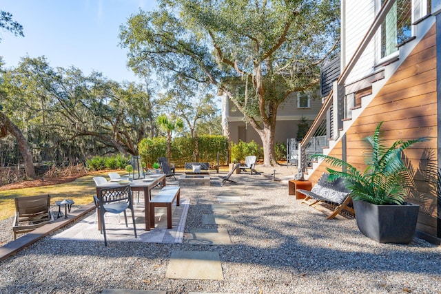 view of patio featuring an outdoor fire pit