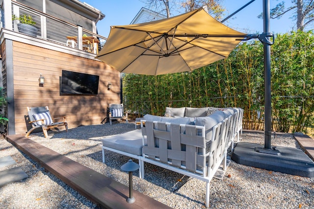 view of patio / terrace with a balcony