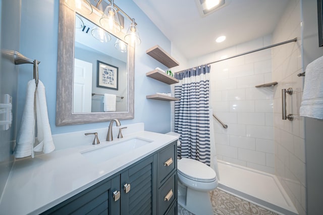 full bathroom with tiled shower, vanity, and toilet